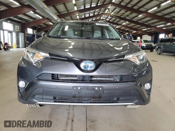 2016 Toyota RAV4 Hybrid XLE with VIN JTMRJREV0GD035203, listed as a Copart auction lot 54300225 with 153,369 mi miles and Salvage Title. Bid and sale history available at carsss.com. Image 5.