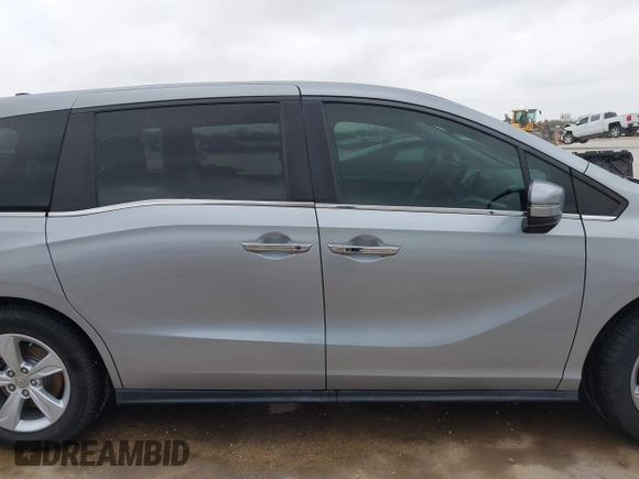 2018 Honda Odyssey EX-L with VIN 5FNRL6H73JB105024, listed as a IAAI auction lot 41663862 with 76,172 mi miles. Bid and sale history available at carsss.com. Image 14.