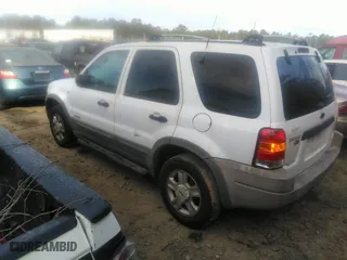 2001 Ford Escape XLT with VIN 1FMYU03171KE99182, listed as a IAAI auction lot 40856356 with 176,540 mi miles. Bid and sale history available at carsss.com. Image 3.