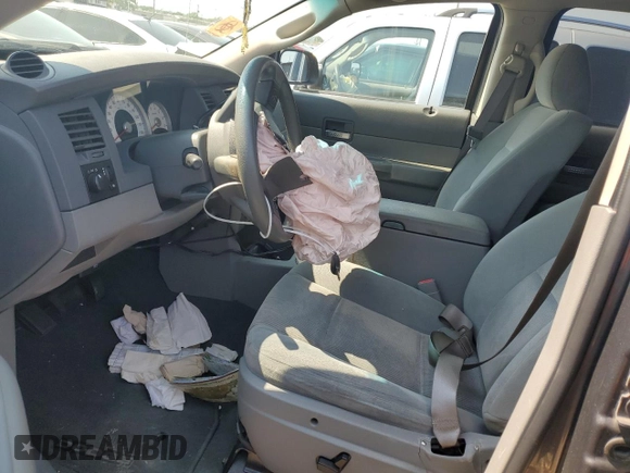 2004 Dodge Durango SLT z VIN 1D4HB48N14F168496, wystawiony jako Copart lot #59863915 z przebiegiem 99 629 mil mil oraz Szkoda całkowita • Salvage title. Historia ofert i sprzedaży dostępna na DreamBid. Obrazek 7.