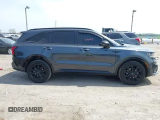 2023 Kia Sorento SX z VIN 5XYRK4LF0PG171635, wystawiony jako IAAI lot #42116649 z przebiegiem 75 348 mil mil oraz . Historia ofert i sprzedaży dostępna na DreamBid. Obrazek 13.