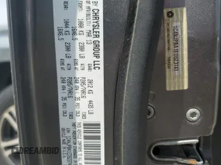 2014 Jeep Patriot Altitude z VIN 1C4NJPBA1ED523741, wystawiony jako Copart lot #59287135 z przebiegiem 194 757 mil mil oraz Szkoda całkowita • Salvage title. Historia ofert i sprzedaży dostępna na DreamBid. Obrazek 13.