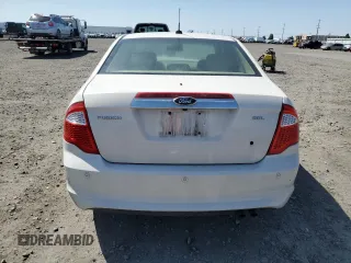 2012 Ford Fusion SEL with VIN 3FAHP0JA6CR162005, listed as a Copart auction lot 54598715 with 198,784 mi miles and Salvage Title. Bid and sale history available at carsss.com. Image 6.
