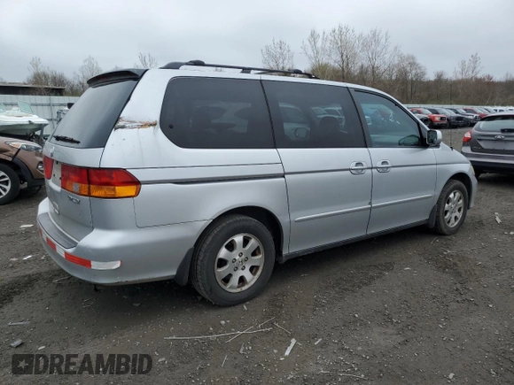 2003 Honda Odyssey EX-L z VIN 5FNRL18983B043014, wystawiony jako Copart lot #52568405 z przebiegiem 194 266 mil mil oraz Czysty tytuł • Clean title. Historia ofert i sprzedaży dostępna na DreamBid. Obrazek 3.