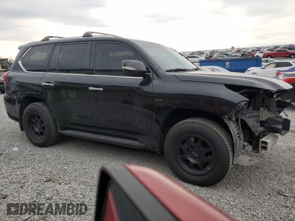 2019 Lexus LX 570 with VIN JTJHY7AX7K4310302, listed as a Copart auction lot 82034744 with 96,980 mi miles and Salvage title. Bid and sale history available at DreamBid. Image 4.