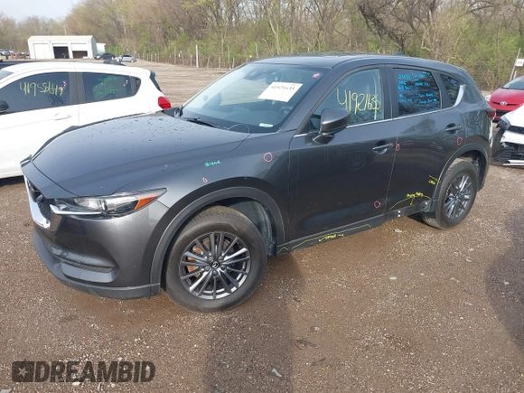 2020 Mazda CX-5 Touring with VIN JM3KFBCM8L0863951, listed as a IAAI auction lot 41921635 with 88,629 mi miles. Bid and sale history available at carsss.com. Image 19.
