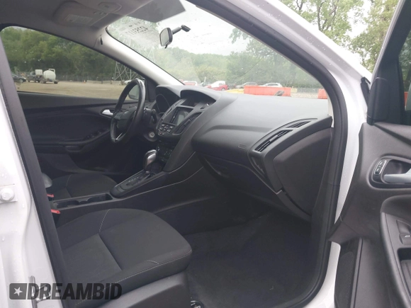2016 Ford Focus SE with VIN 1FADP3F21GL288553, listed as a IAAI auction lot 42253117 with 107,727 mi miles and . Bid and sale history available at DreamBid. Image 5.
