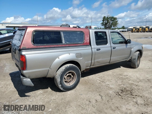 2004 Nissan Frontier XE with VIN 1N6ED29X24C436064, listed as a Copart auction lot 58916434 with 277,026 mi miles and Salvage title. Bid and sale history available at DreamBid. Image 3.