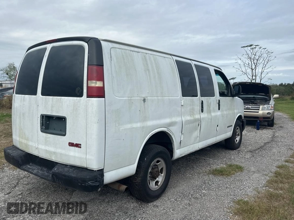 2003 GMC Savana Cargo z VIN 1GTHG35U431113170, wystawiony jako Copart lot #82019294 z przebiegiem 293 807 mil mil oraz Czysty tytuł • Clean title. Historia ofert i sprzedaży dostępna na DreamBid. Obrazek 4.
