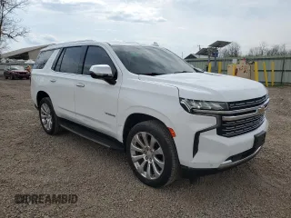 2023 Chevrolet Tahoe Premier with VIN 1GNSKSKD0PR217513, listed as a Copart auction lot 54702845 with 55,424 mi miles and Salvage title. Bid and sale history available at DreamBid. Image 4.