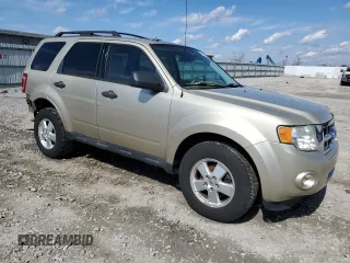 2011 Ford Escape XLT with VIN 1FMCU0D79BKC18711, listed as a Copart auction lot 51638425 with 150,104 mi miles and Salvage Title. Bid and sale history available at carsss.com. Image 4.