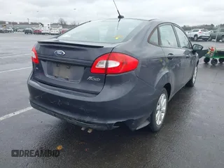 2012 Ford Fiesta SE with VIN 3FADP4BJ0CM155729, listed as a IAAI auction lot 41800447 with 90,091 mi miles. Bid and sale history available at carsss.com. Image 6.