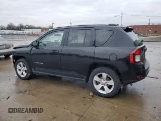 2016 Jeep Compass Latitude with VIN 1C4NJCEB7GD664653, listed as a Copart auction lot 87313664 with 64,580 mi miles and Salvage Title. Bid and sale history available at carsss.com. Image 2.