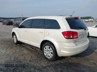 2015 Dodge Journey SE z VIN 3C4PDCAB9FT592689, wystawiony jako IAAI lot #42108322 z przebiegiem 158 140 mil mil oraz . Historia ofert i sprzedaży dostępna na DreamBid. Obrazek 3.