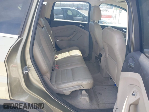 2013 Ford Escape SEL with VIN 1FMCU0HX3DUB37785, listed as a IAAI auction lot 41863069 with 179,508 mi miles. Bid and sale history available at carsss.com. Image 8.