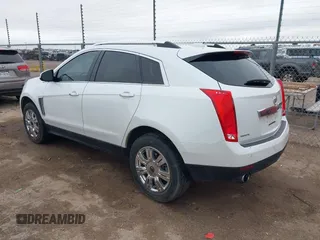 2016 Cadillac SRX Luxury Collection z VIN 3GYFNBE36GS519495, wystawiony jako IAAI lot #42147882 z przebiegiem 126 689 mil mil oraz . Historia ofert i sprzedaży dostępna na DreamBid. Obrazek 3.