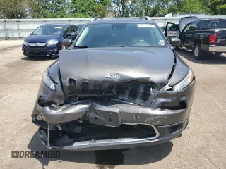 2014 Jeep Cherokee Limited with VIN 1C4PJMDS4EW211057, listed as a Copart auction lot 63448375 with Not provided miles and Salvage title. Bid and sale history available at DreamBid. Image 5.