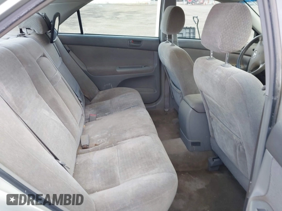 2004 Toyota Camry LE with VIN JTDBE32K640257695, listed as a IAAI auction lot 41837872 with 214,917 mi miles. Bid and sale history available at carsss.com. Image 8.