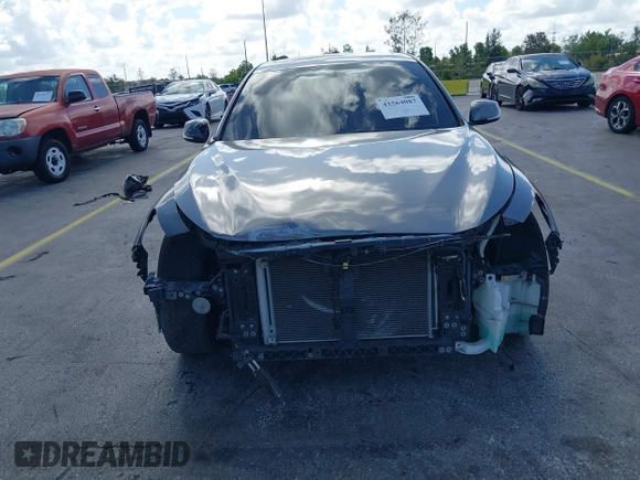 2014 Infiniti Q50 Premium with VIN JN1BV7AP7EM684448, listed as a IAAI auction lot 42564087 with 79,207 mi miles and . Bid and sale history available at DreamBid. Image 6.