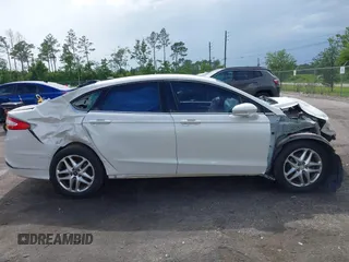 2013 Ford Fusion SE with VIN 3FA6P0H71DR241794, listed as a IAAI auction lot 42469017 with 154,627 mi miles and . Bid and sale history available at DreamBid. Image 14.