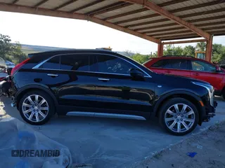 2020 Cadillac XT4 FWD Premium Luxury with VIN 1GYFZCR42LF144359, listed as a IAAI auction lot 42012677 with 34,490 mi miles and . Bid and sale history available at carsss.com. Image 14.