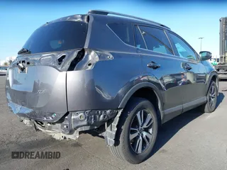 2017 Toyota RAV4 XLE with VIN 2T3WFREV2HW349394, listed as a IAAI auction lot 42194908 with 122,519 mi miles and . Bid and sale history available at DreamBid. Image 4.