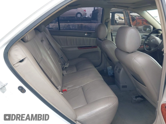 2003 Toyota Camry LE with VIN JTDBE32K530180834, listed as a IAAI auction lot 42255688 with 134,594 mi miles and . Bid and sale history available at DreamBid. Image 8.