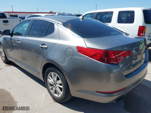 2013 Kia Optima LX with VIN 5XXGM4A75DG225038, listed as a IAAI auction lot 42108738 with 219,264 mi miles. Bid and sale history available at carsss.com. Image 3.