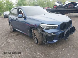 2021 BMW X5 xDrive40i z VIN 5UXCR6C01M9E66833, wystawiony jako IAAI lot #42199295 z przebiegiem 59 386 mil mil oraz . Historia ofert i sprzedaży dostępna na DreamBid. Obrazek 1.
