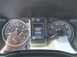 2021 Toyota Tacoma SR with VIN 3TMCZ5AN6MM393306, listed as a IAAI auction lot 42094095 with 57,217 mi miles and . Bid and sale history available at DreamBid. Image 7.