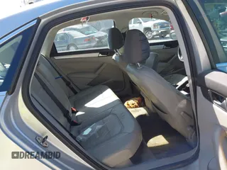 2012 Volkswagen Passat SE z VIN 1VWBP7A36CC070205, wystawiony jako IAAI lot #42123358 z przebiegiem 154 494 mil mil oraz . Historia ofert i sprzedaży dostępna na DreamBid. Obrazek 8.