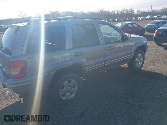 2001 Jeep Grand Cherokee Limited with VIN 1J4GW58N11C650606, listed as a IAAI auction lot 41722256 with 1 mi miles. Bid and sale history available at carsss.com. Image 4.
