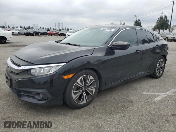 2016 Honda Civic EX-T z VIN 2HGFC1F33GH634029, wystawiony jako Copart lot #56026045 z przebiegiem 168 676 mil mil oraz Szkoda całkowita • Salvage title. Historia ofert i sprzedaży dostępna na DreamBid. Obrazek 1.