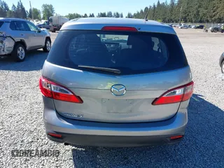 2014 Mazda 5 Sport z VIN JM1CW2BL0E0172678, wystawiony jako IAAI lot #42192057 z przebiegiem 89 848 mil mil oraz . Historia ofert i sprzedaży dostępna na DreamBid. Obrazek 16.