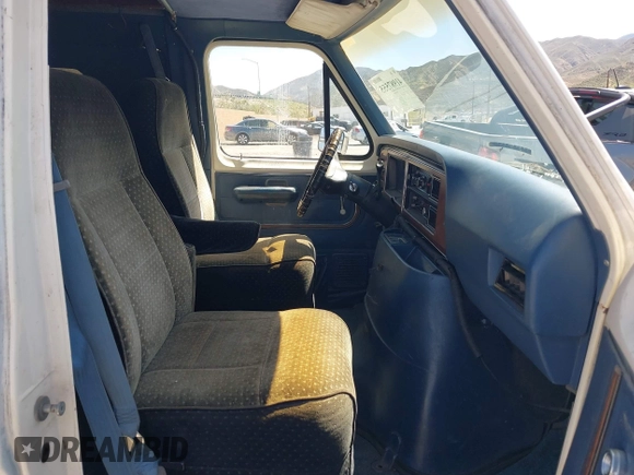 1985 Ford Econoline Cargo with VIN 1FBHS31L3FHA83624, listed as a IAAI auction lot 41987555 with 2,242 mi miles and . Bid and sale history available at DreamBid. Image 5.