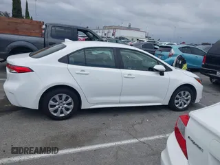 2023 Toyota Corolla LE z VIN JTDB4MEE7PJ001532, wystawiony jako IAAI lot #42073674 z przebiegiem 32 962 mil mil oraz . Historia ofert i sprzedaży dostępna na DreamBid. Obrazek 13.