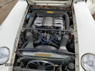 1984 Porsche 928 z VIN WP0JB0921ES860293, wystawiony jako Copart lot #70132694 z przebiegiem 134 907 mil mil oraz Tytuł czysty. Historia ofert i sprzedaży dostępna na DreamBid. Obrazek 12.