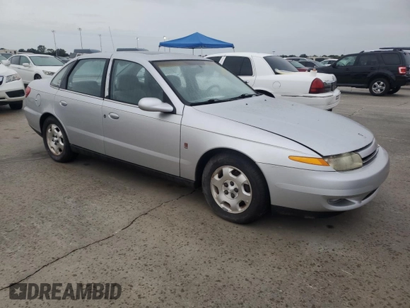 2002 Saturn LS z VIN 1G8JW54R32Y517171, wystawiony jako Copart lot #74849884 z przebiegiem Nie podano mil oraz Szkody całkowita. Historia ofert i sprzedaży dostępna na DreamBid. Obrazek 4.