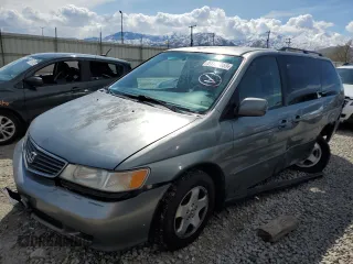 2000 Honda Odyssey EX with VIN 2HKRL1860YH532814, listed as a Copart auction lot 51780855 with 186,328 mi miles and Salvage Title. Bid and sale history available at DreamBid. Image 1.
