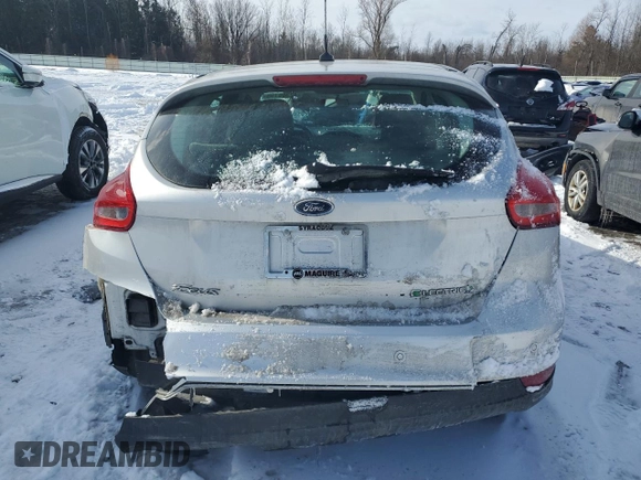 2016 Ford Focus Electric z VIN 1FADP3R42GL380784, wystawiony jako Copart lot #42308195 z przebiegiem 8167 mil mil oraz Szkody całkowita. Historia ofert i sprzedaży dostępna na DreamBid. Obrazek 6.