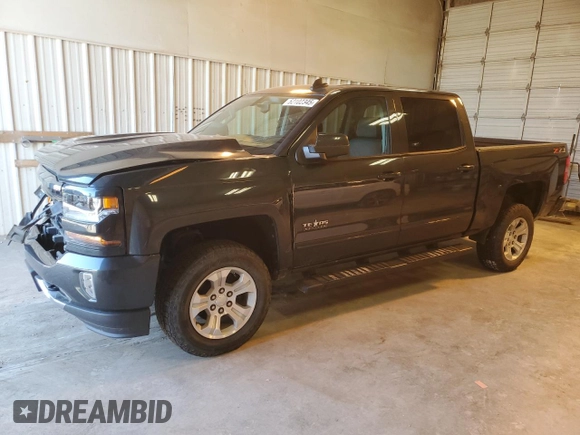 2018 Chevrolet Silverado 1500 LT with VIN 3GCUKRECXJG283331, listed as a Copart auction lot 52102345 with 69,603 mi miles and Salvage Title. Bid and sale history available at DreamBid. Image 1.