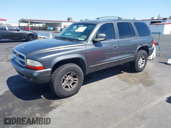 2001 Dodge Durango z VIN 1B4HS28N81F643555, wystawiony jako IAAI lot #42725611 z przebiegiem 271 428 mil mil oraz . Historia ofert i sprzedaży dostępna na DreamBid. Obrazek 2.