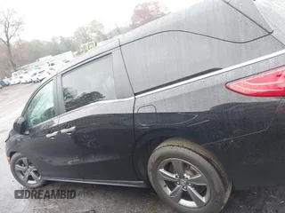 2021 Honda Odyssey EX with VIN 5FNRL6H53MB010305, listed as a IAAI auction lot 41028592 with 39,368 mi miles and . Bid and sale history available at DreamBid. Image 14.