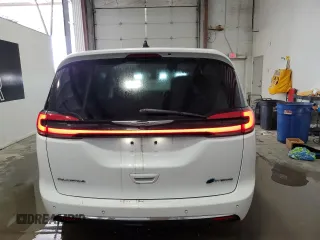 2023 Chrysler Pacifica Hybrid Touring L with VIN 2C4RC1L75PR611607, listed as a Copart auction lot 61475985 with 63,241 mi miles and Clean title. Bid and sale history available at DreamBid. Image 6.
