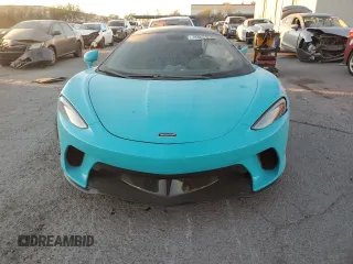 2023 McLaren GT z VIN SBM22GCA0PW002765, wystawiony jako Copart lot #78866364 z przebiegiem Nie podano mil oraz Szkody całkowita. Historia ofert i sprzedaży dostępna na DreamBid. Obrazek 5.