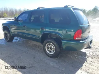 2000 Dodge Durango z VIN 1B4HS28Z0YF170313, wystawiony jako IAAI lot #41690703 z przebiegiem 283 237 mil mil oraz . Historia ofert i sprzedaży dostępna na DreamBid. Obrazek 3.