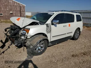 2015 Nissan Armada Platinum z VIN 5N1BA0NE6FN611345, wystawiony jako Copart lot #76176424 z przebiegiem Nie podano mil oraz Szkoda całkowita • Salvage title. Historia ofert i sprzedaży dostępna na DreamBid. Obrazek 1.