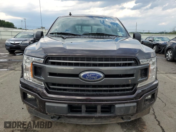 2019 Ford F-150 XL with VIN 1FTEW1EP4KFD32054, listed as a Copart auction lot 63622085 with 76,386 mi miles and Salvage title. Bid and sale history available at DreamBid. Image 5.