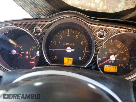 2004 Nissan 350Z Touring with VIN JN1AZ34E64T060440, listed as a Copart auction lot 79082914 with 178,742 mi miles and Salvage Title. Bid and sale history available at carsss.com. Image 9.