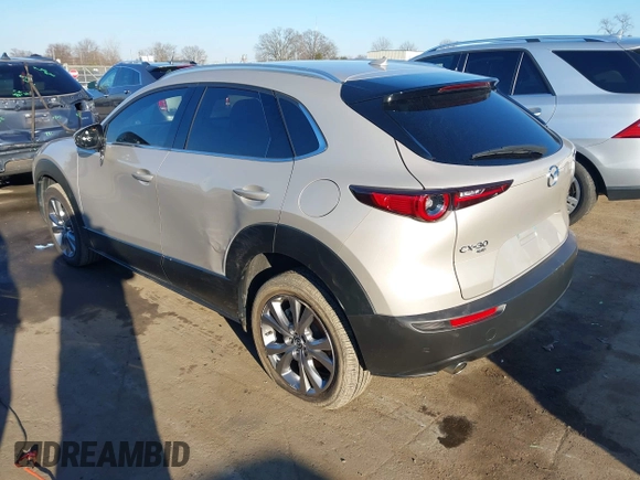 2024 Mazda CX-30 S Premium with VIN 3MVDMBDM9RM628162, listed as a IAAI auction lot 41262359 with 30,392 mi miles and . Bid and sale history available at DreamBid. Image 3.